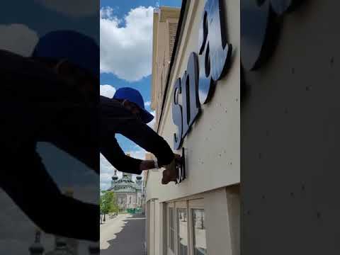 Snatched by Ale New Location Cutout Letter Sign Installation 2